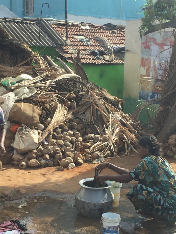 Woman doing laundry in India