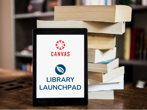 An iPad with Canvas and the Library Launchpad on the screen leaning against a stack of books